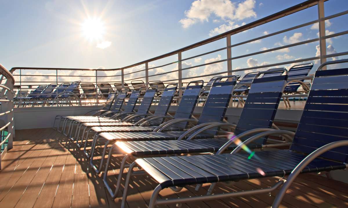 https://tampacruiseport.com/wp-content/uploads/2016/01/Chaise-longues-on-deck-of-cruise-ship-red.jpg